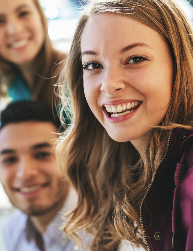 Woman with her friends smiling