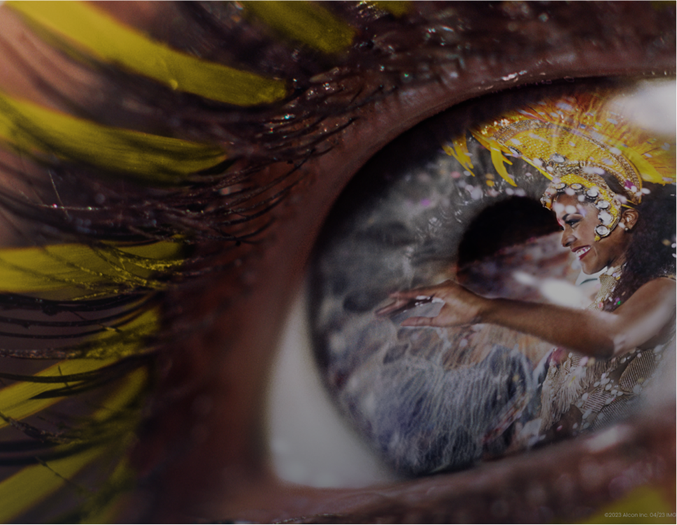 A colorful close-up image of an eye looking off into the distance.