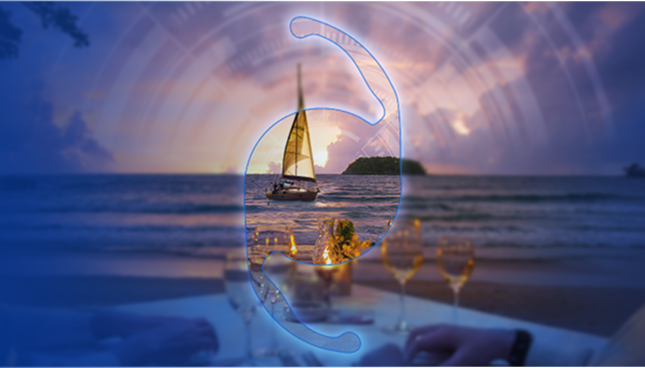 On a mostly blurred background, seen through an IOL graphic, there is a sailboat on the water during sunset, with a table set with drinks.