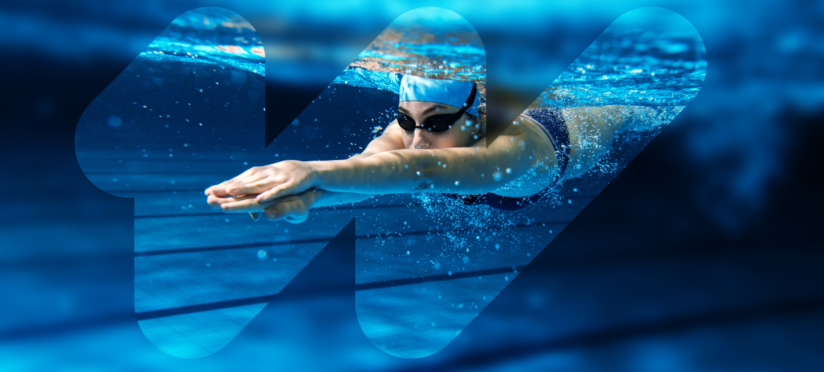A woman swimming in a pool. She is wearing black goggles and a white swim cap. The swimmer is overlaid with the wavelight® logo.