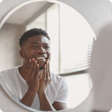 Man looking in the mirror