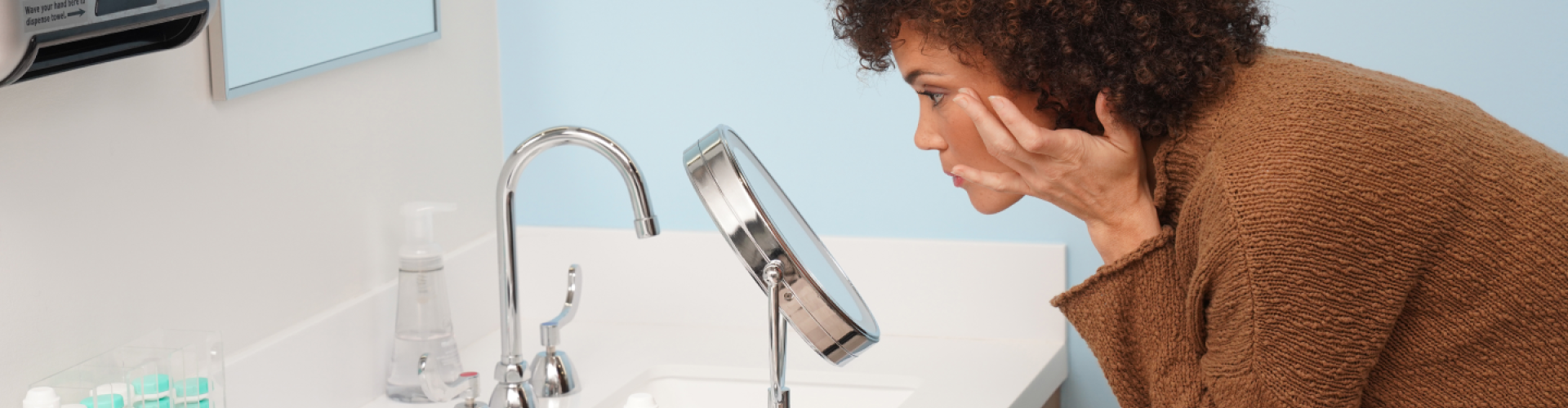 Woman looking in the mirror