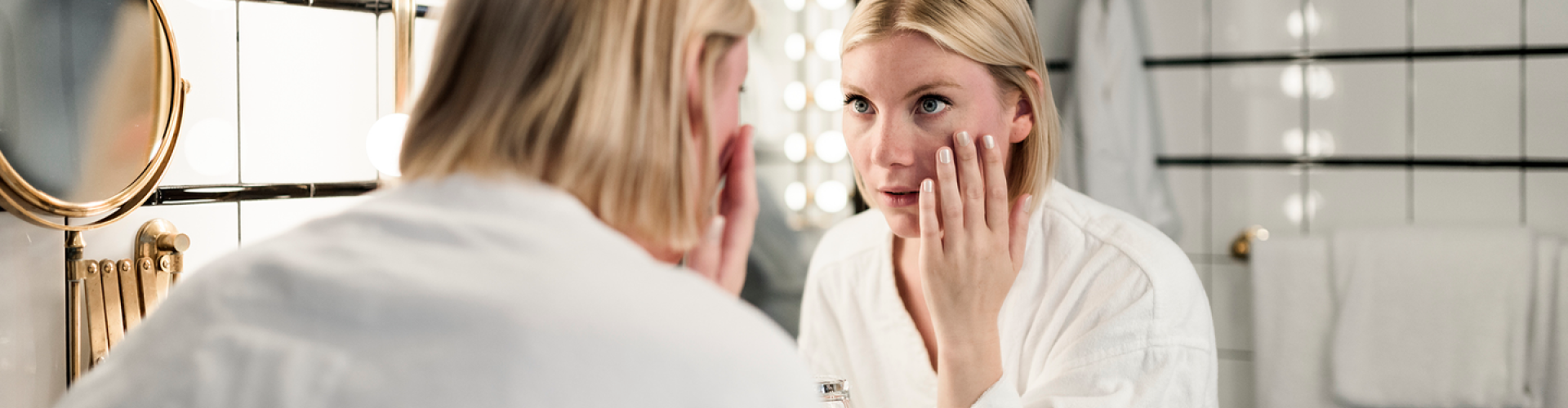 woman removing contact lenses