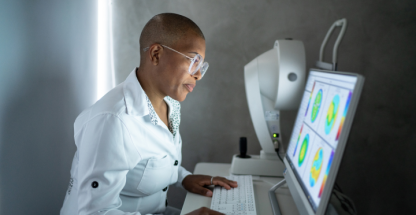 Ophthalmologist at medical equipment