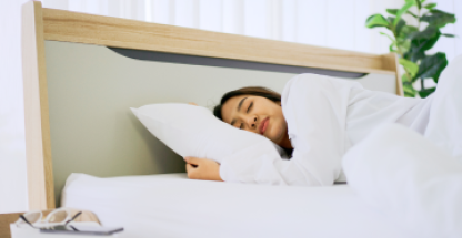 Sleeping person in bed