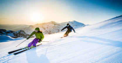 Two people skiing