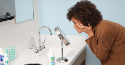 Woman looking in the mirror