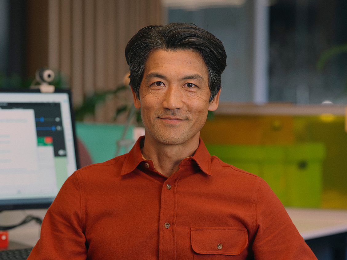 Smiling man in a red T-shirt