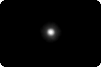 Black background with a bright light in the middle with a slight halo around the light, representing the optical bench halo measurement for AcrySof IQ Vivity® IOL.