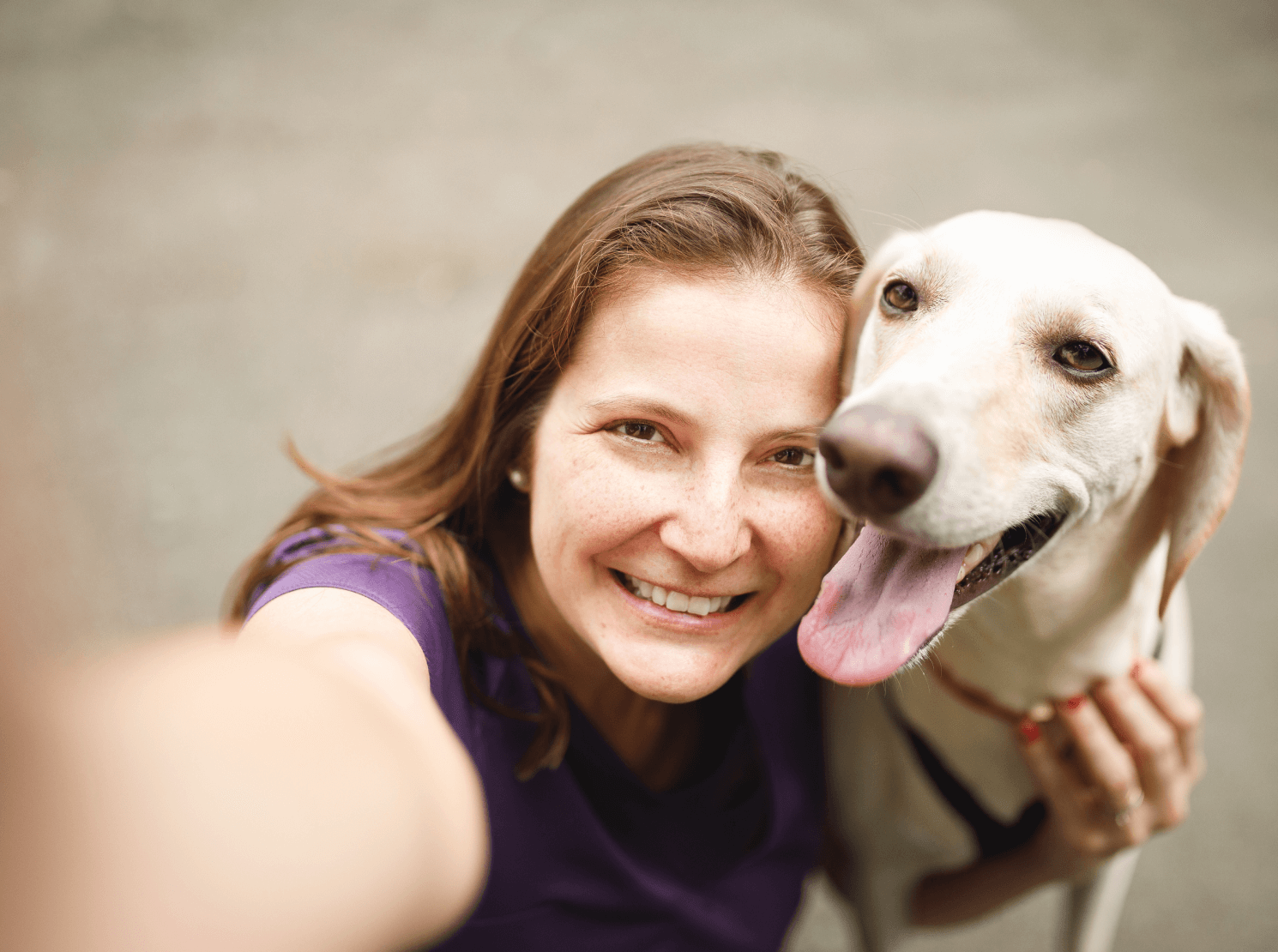 Smiling woman with dog