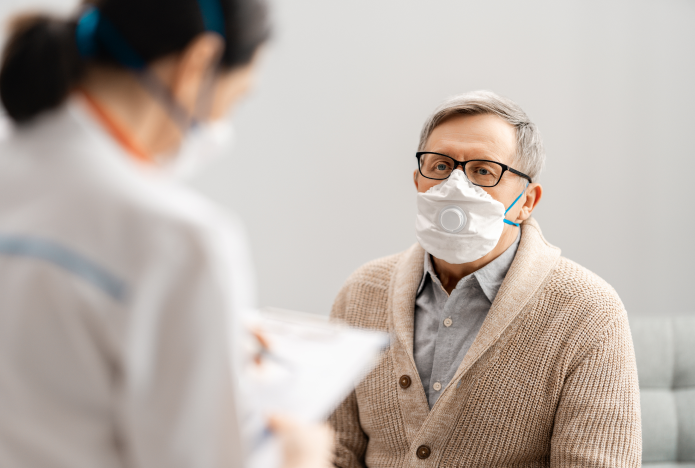 Elderly man wearing mask