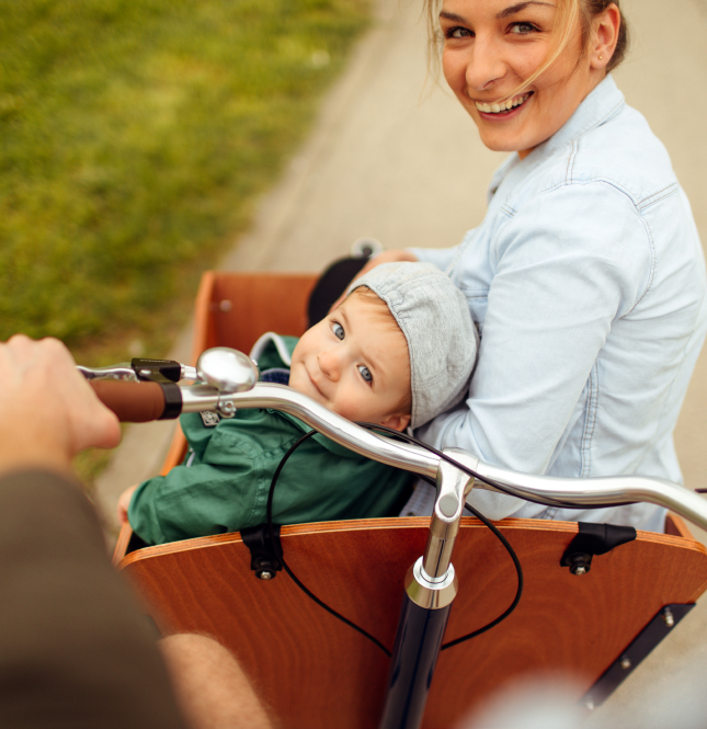 Woman with child on bike