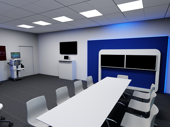 Moderner Schulungsraum im Alcon Showroom in Aschaffenburg mit Konferenztisch, Monitoren und medizinischem Gerät für Produktdemos und Trainings.