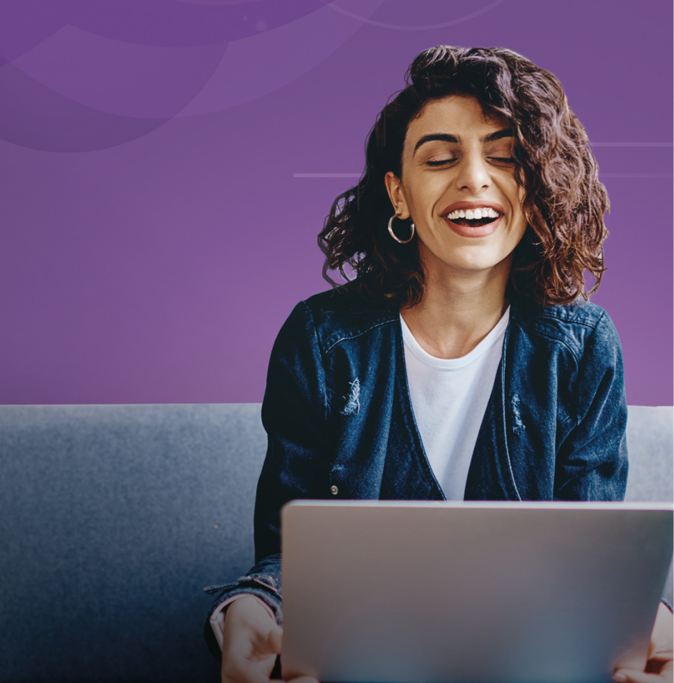 Smiling woman with laptop