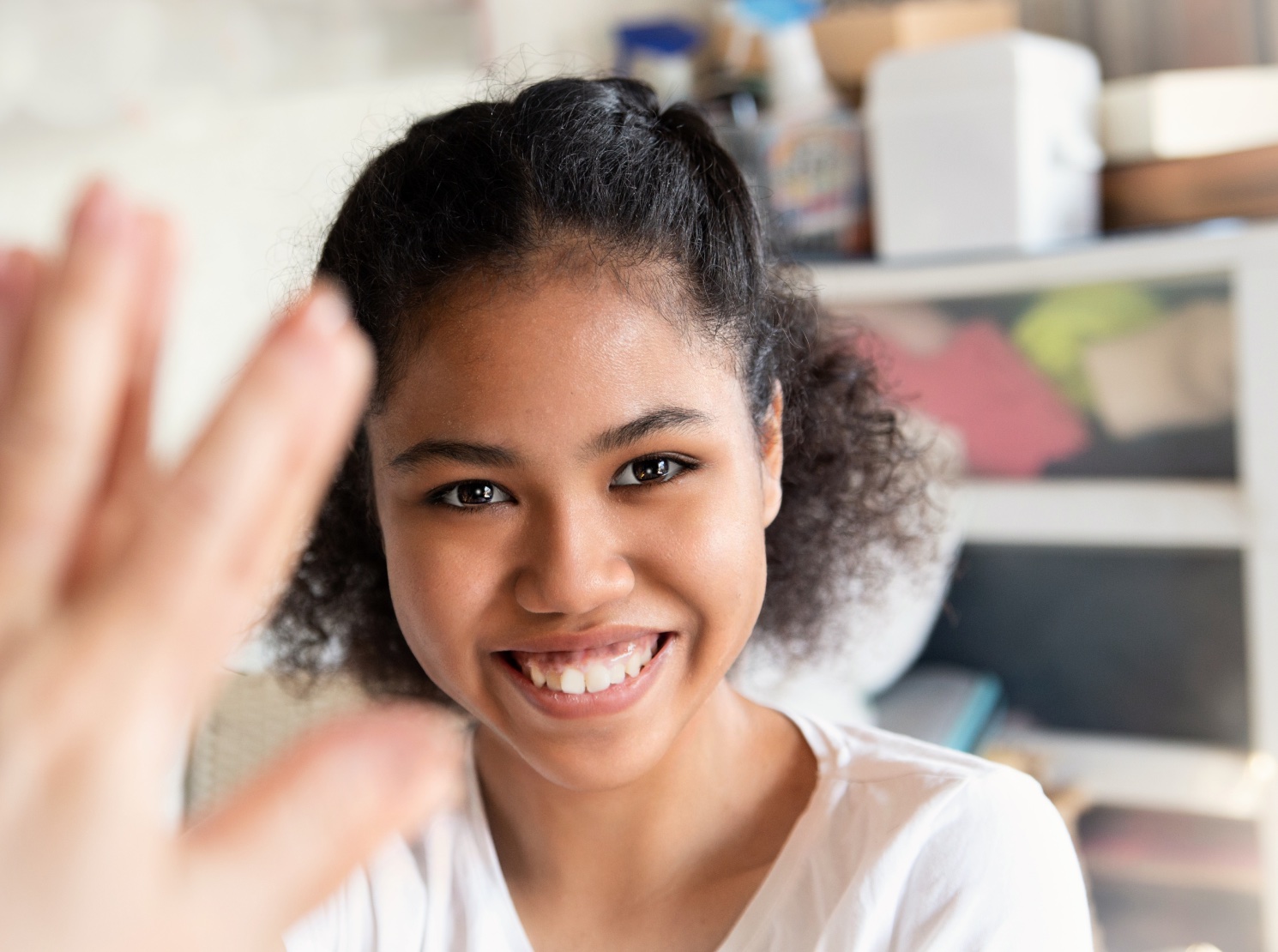 smiling waving woman