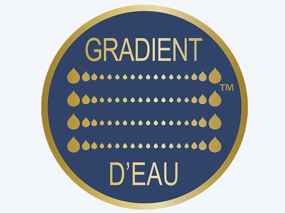 Icône circulaire représentant la technologie Gradient d’eau, illustrée par des gouttes de différentes tailles et la mention « Gradient d’eau ».