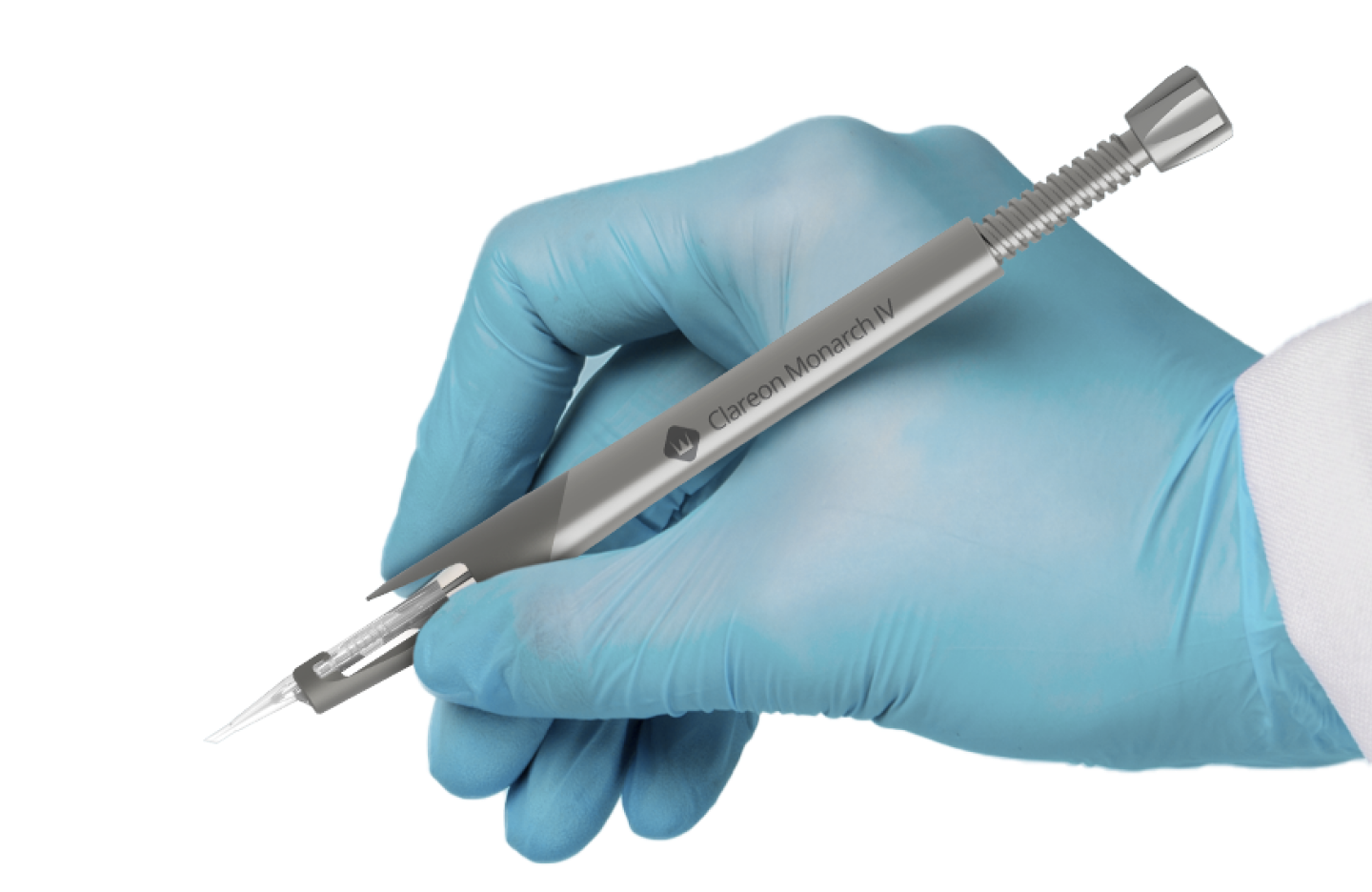 Hand wearing a disposable glove holding a Clareon Monarch IV Handpiece, pointing downwards.