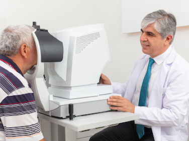 Ophthalmologist talking to the patient