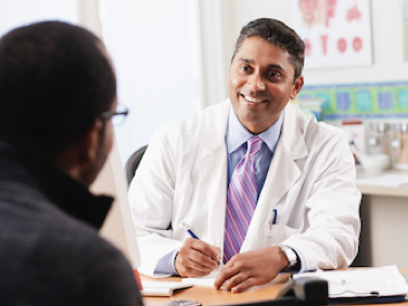 Ophthalmologist talking to the patient