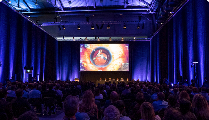A group of people during a presentation