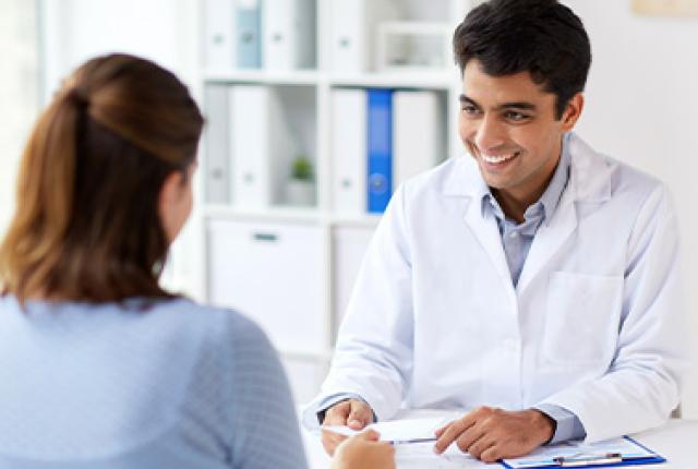 A doctor talking to a patient