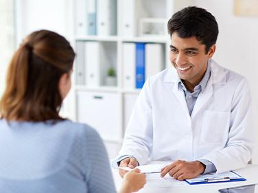 A doctor talking to a patient