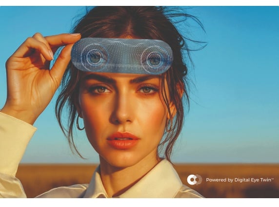 Woman holding a transparent, digitally rendered eye-lens interface over her eyes against a desert landscape, illustrating vision technology powered by a digital eye twin.