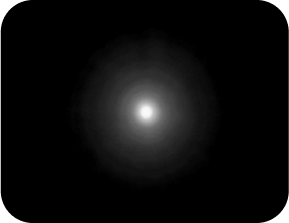 Black background with a bright light in the middle, with a halo around the light larger than the Clareon Monofocal and Clareon Vivity IOLs, representing the optical bench halo measurement for Clareon PanOptix IOL.