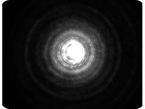 Black background with a bright light in the middle, showing the largest halo around the light compared to the three other images, representing the optical bench halo measurement for ZEISS AT LARA Diffractive EDF IOL.