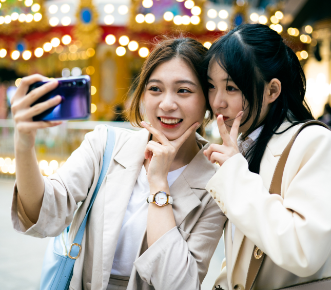 Two smiling women taking a picture