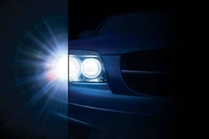 An image of the headlights of a car
