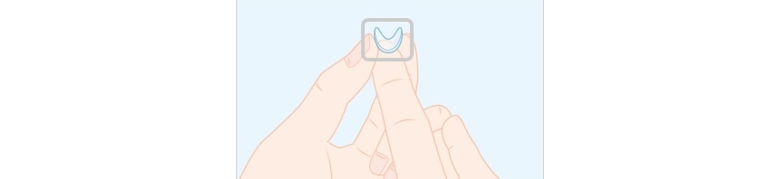 Demonstration of handling a contact lens safely