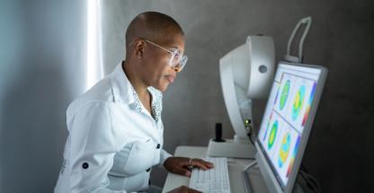 Ophthalmologist at medical equipment teaser