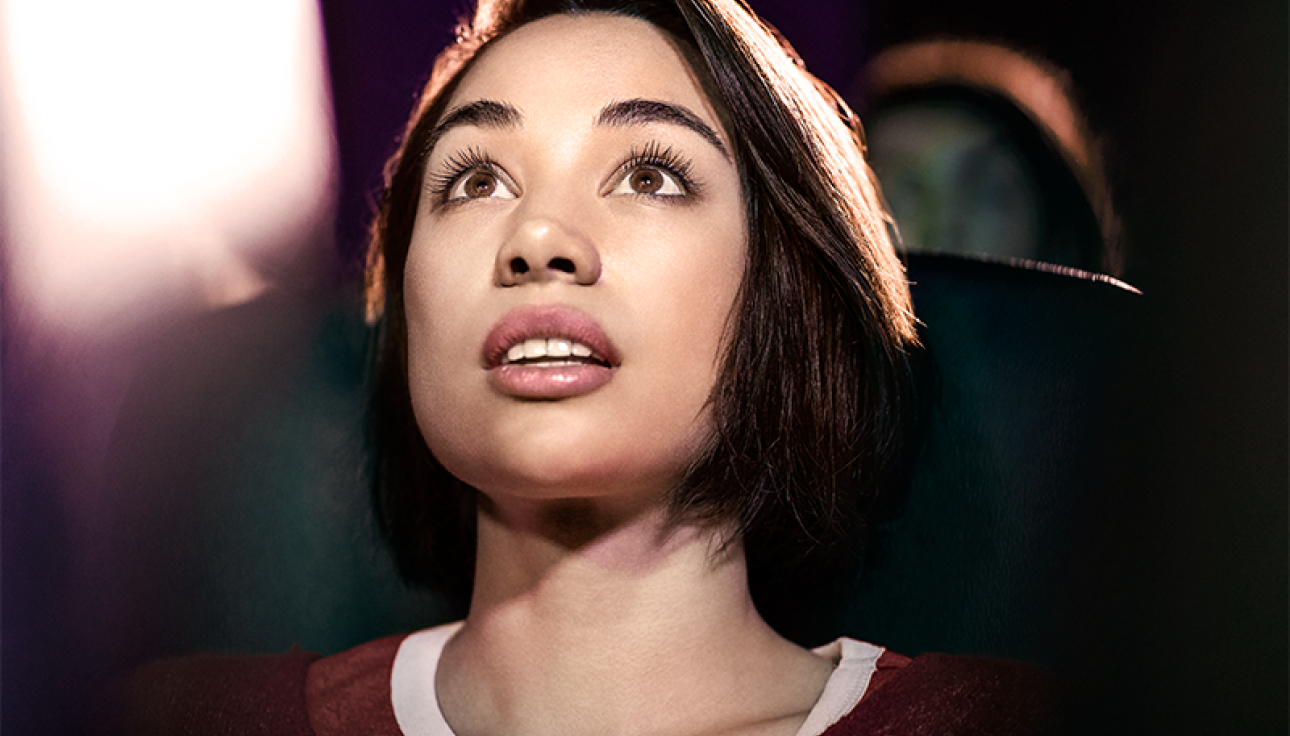 Woman watching in cinema