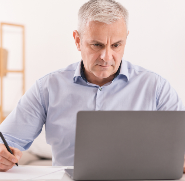 old man with laptop