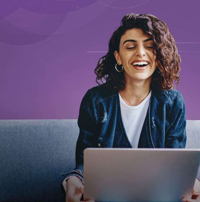 woman with laptop smiling