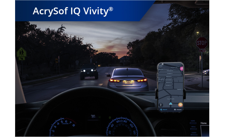Car on the road in dim lighting with phone set up on the dashboard. White text at the top left corner of this image reads “AcrySof IQ Vivity.”