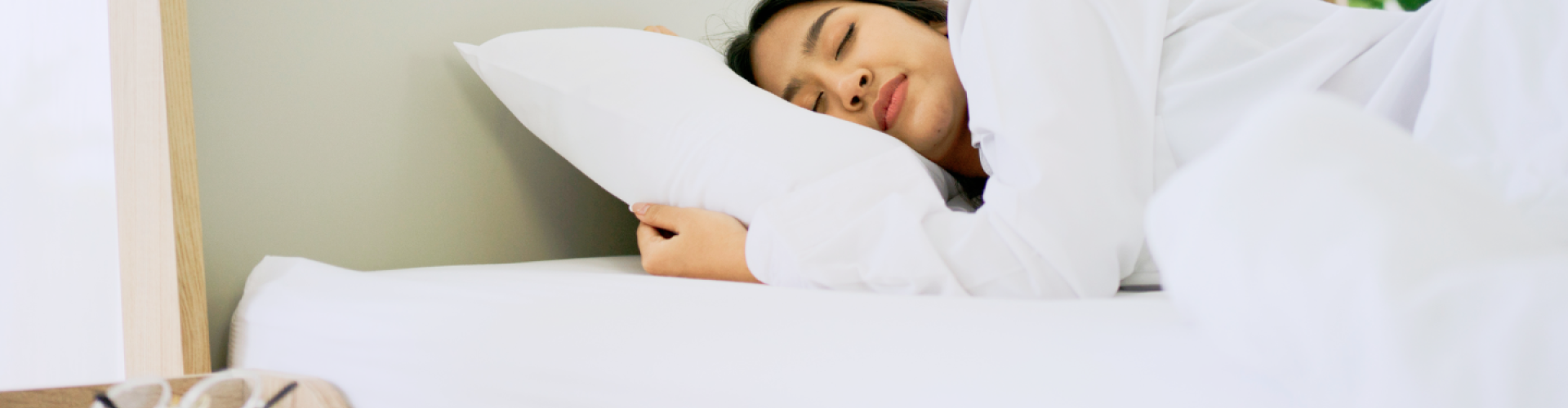 Person sleeping in bed