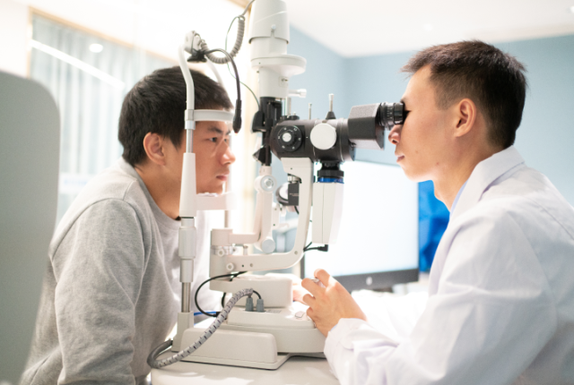 Eye care professional and patient during an eye examination