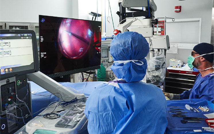 Image of an eye vision surgery with 2 doctors