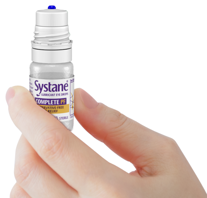 hand holding ergonomic multi-dose bottle of Systane Complete Preservative-Free