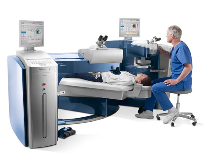 A doctor examining a patient on a Alcon Wavelight machine.