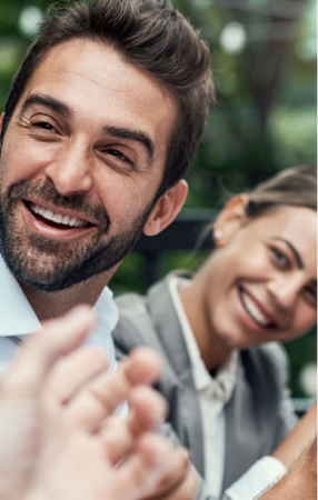 Couple smiling and clapping