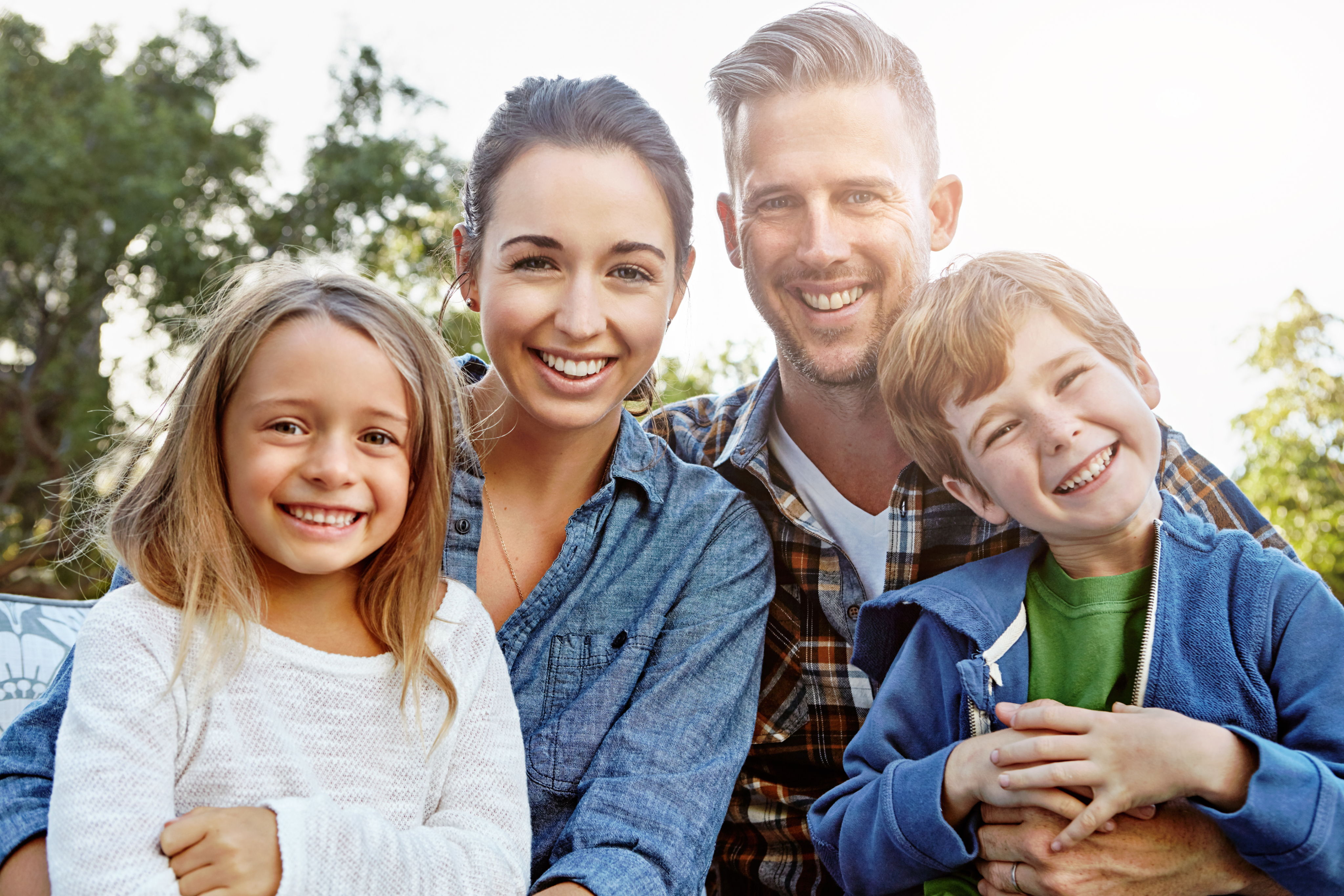Family smiling hugging