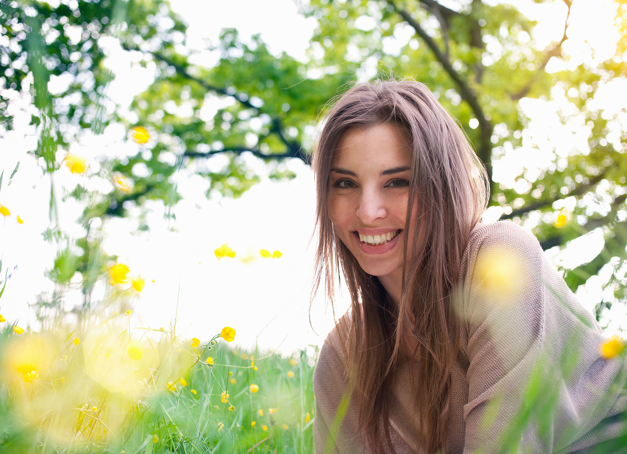A smiling woman in the park