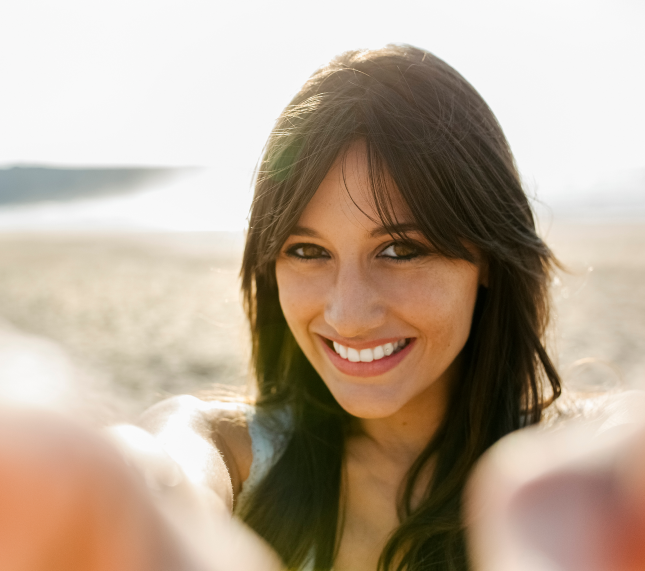 Young woman smiling on the phone