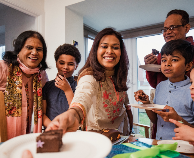 Family at a dinner serving dessert