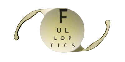 Close up of an AcrySof IQ IOL with letters behind it, showing full use of the 6mm aspheric optic