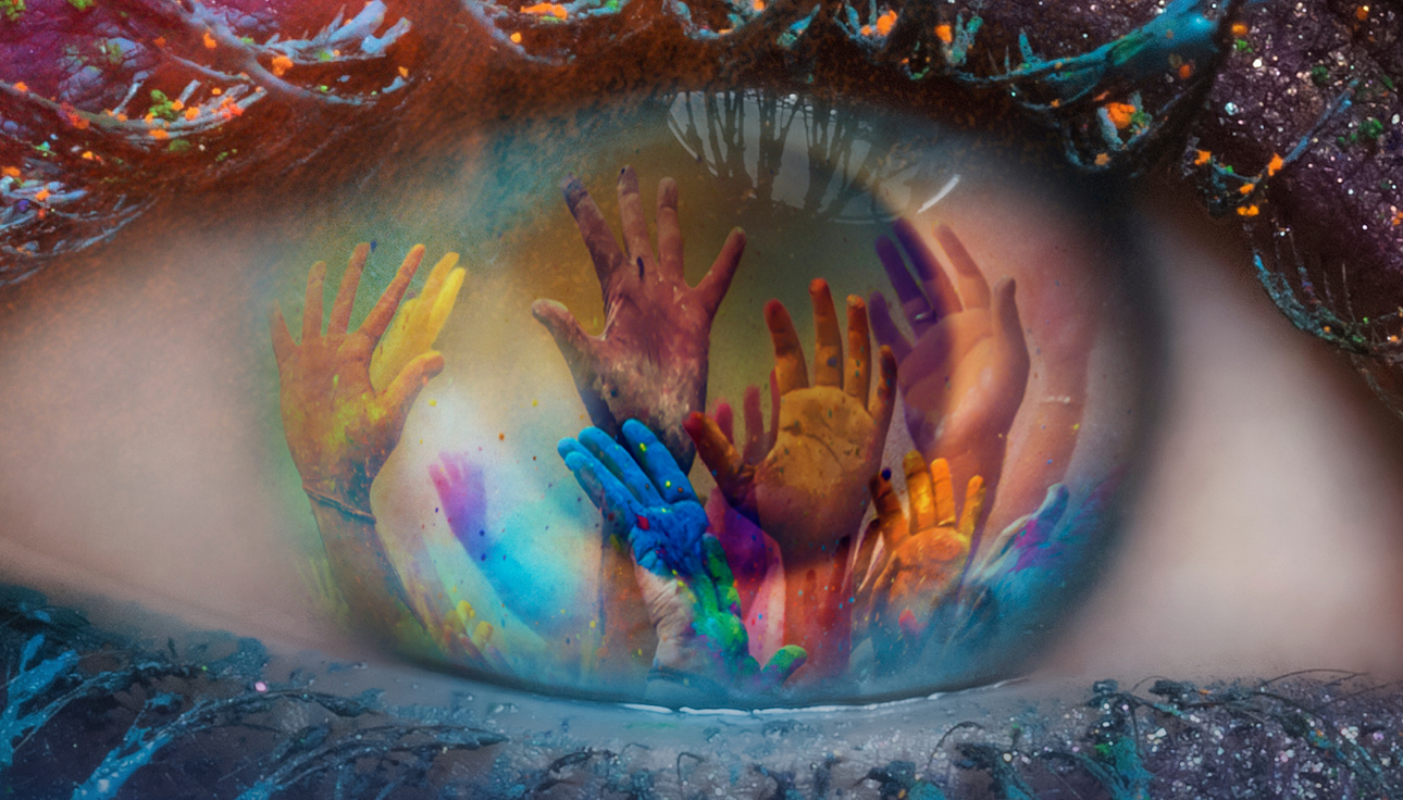 A colorful, close-up image of an eye. Multiple hands appear in the reflection of the eye. The reflection of the hands appear as though they are raised in the air.