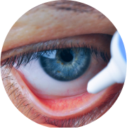 Closeup applying dry eye gel in lower eye lid